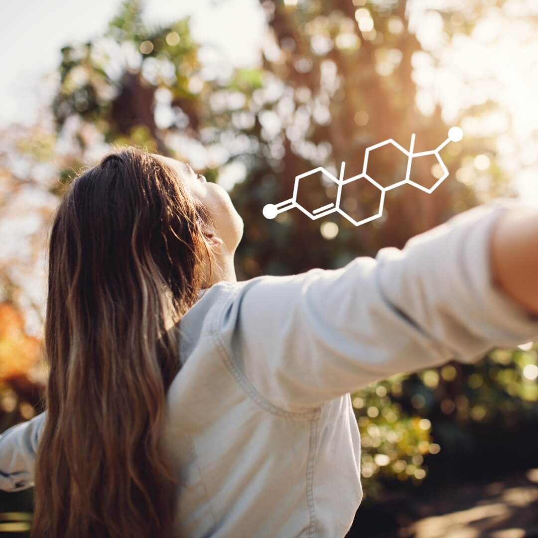 Image of woman looking into the sun.