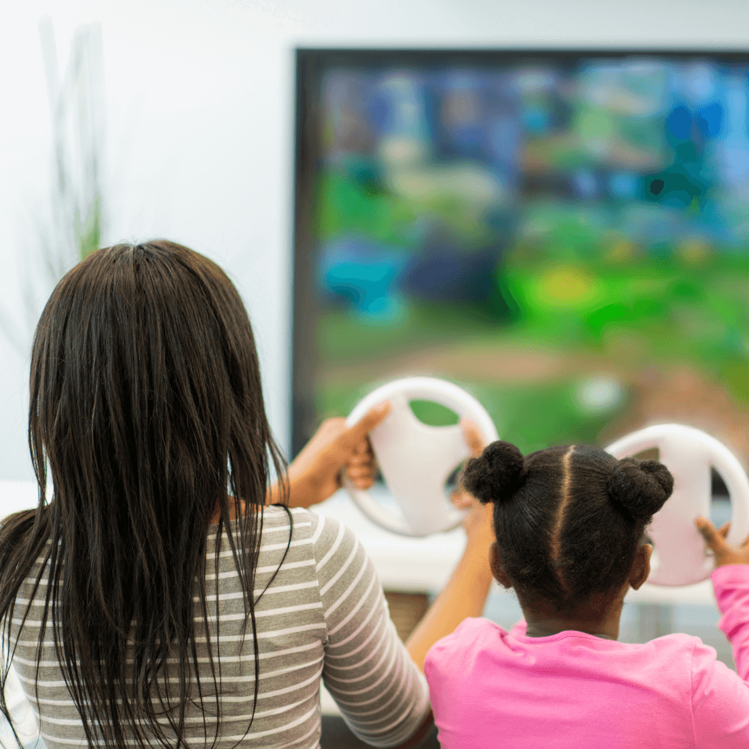 a mom and daughter playing an active video game